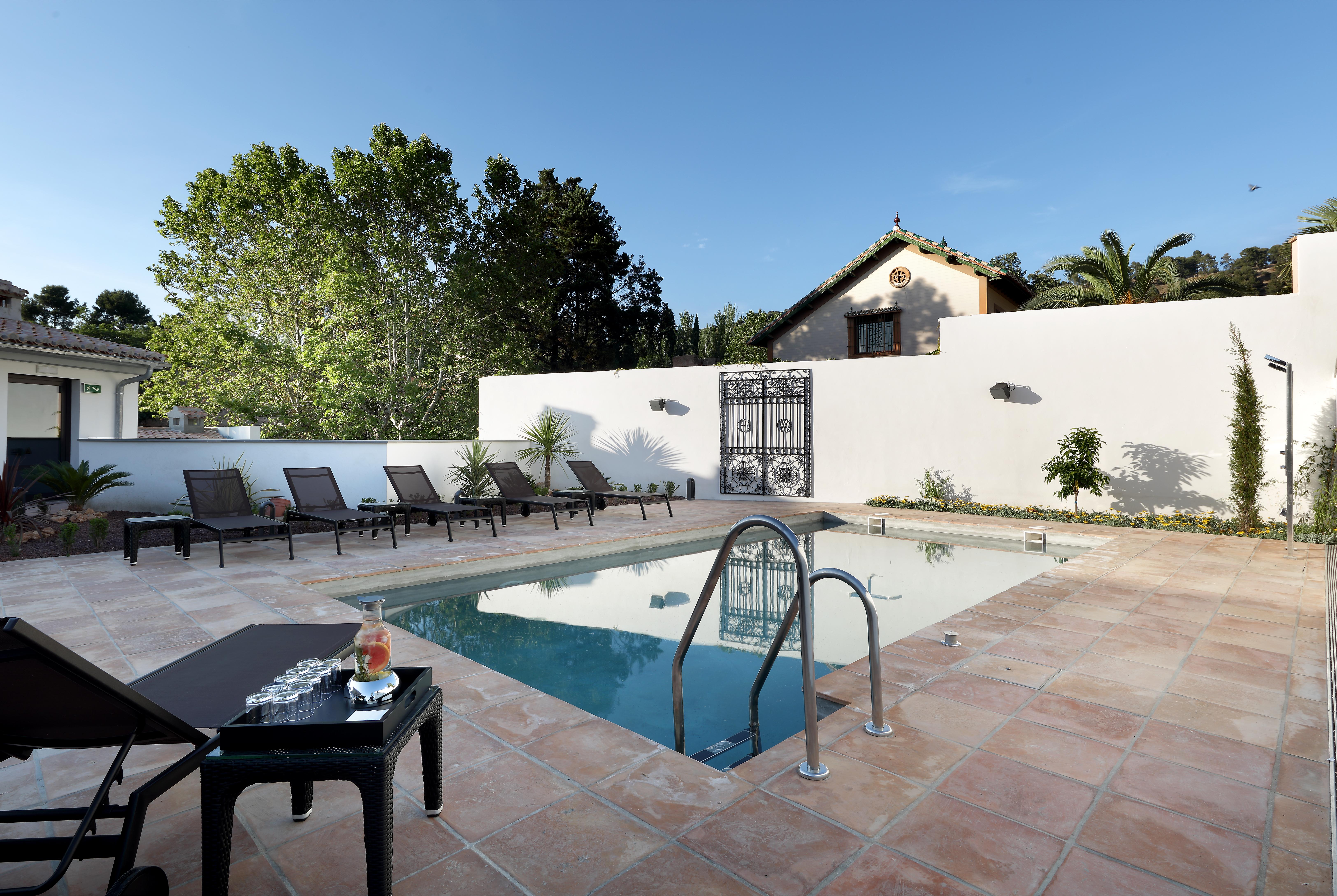 ยูโรสตาร์ วอชิงตัน เออร์วิง Hotel กรานาดา ภายนอก รูปภาพ Villa's swimming pool